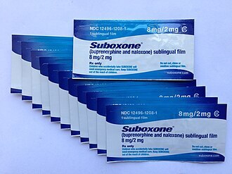A stack of Suboxone 8 mg/2 mg sublingual film packets, labeled for prescription use and commonly used in Medically Assisted Treatment for opioid addiction, displayed on a white background.