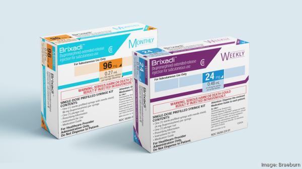 Two boxes of Brixadi medication, used in opioid addiction treatment, one labeled Monthly (96 mg/0.27 mL) and the other Weekly (24 mg/0.48 mL), both designed for subcutaneous injection as part of Medically Assisted Treatment.